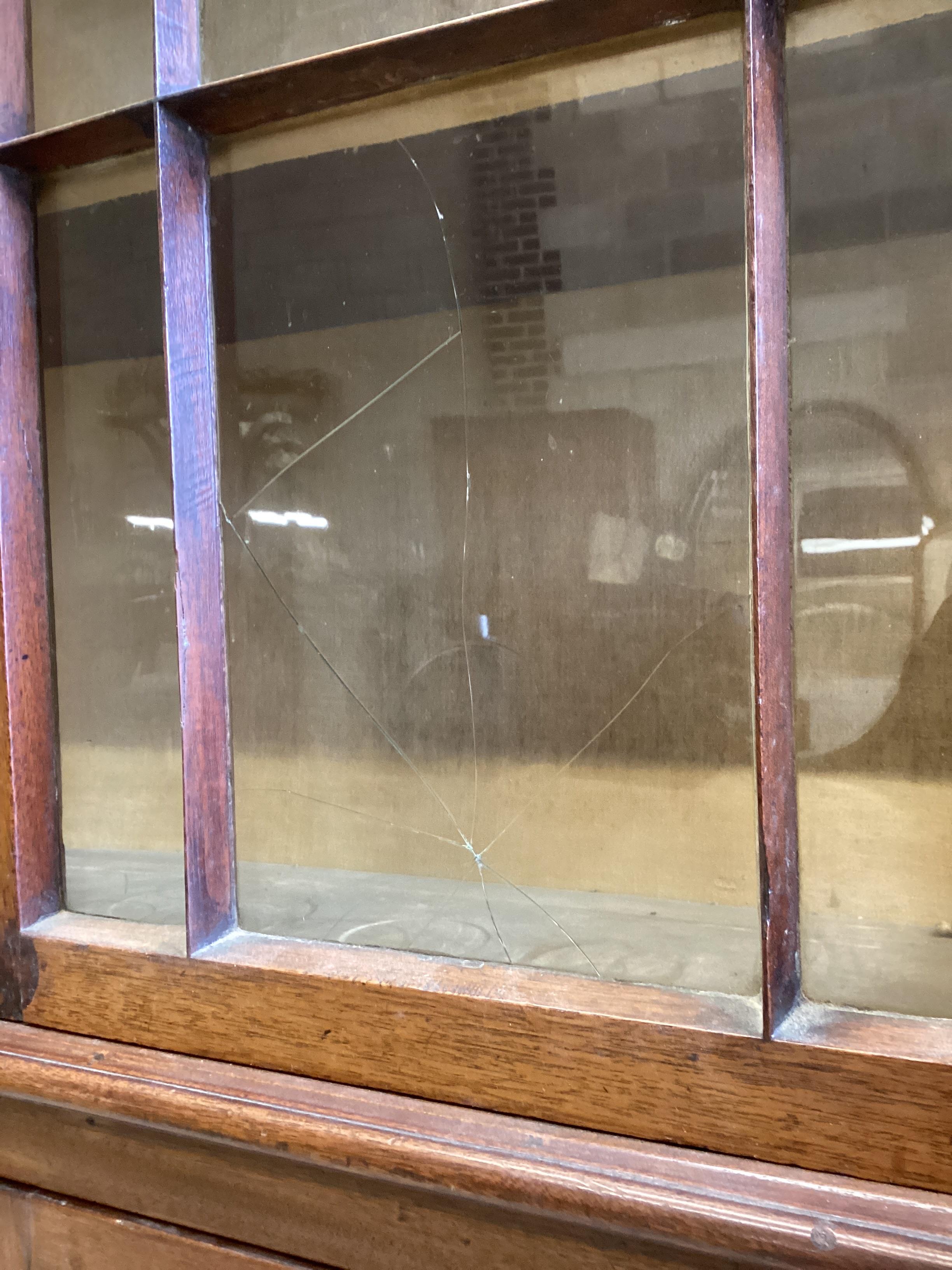 An Edwardian mahogany display cabinet, width 106cm, depth 39cm, height 203cm